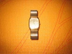 VINTAGE GOLD-TONE TIMEX QUARTZ ANALOG WATCH (DAY-DATE DISPLAY)