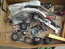 Large Lot of Vintage RC Airplane Metal Nose Gear Tires Brackets and More