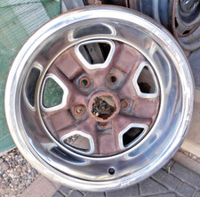 OLDS 15" x 7" FACTORY STEEL RALLY WHEEL w/ TRIM RING & VENT CLIPS. 5 LUG x 4.75"