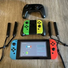 Nintendo Switch w/ 2 Joy-Con Pairs, Pro Controller, and Switch Case