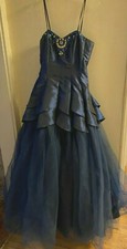 DEB NAVY GOWN  PRINCESS STYLE WITH JEWELS AT THE NECKLINE  SIZE 9/10