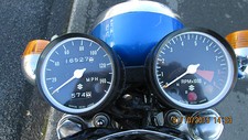 Suzuki TS250 TS400 una coppia di corpi orologio esterni Speedo e Tachimetro nuovi. Secondi