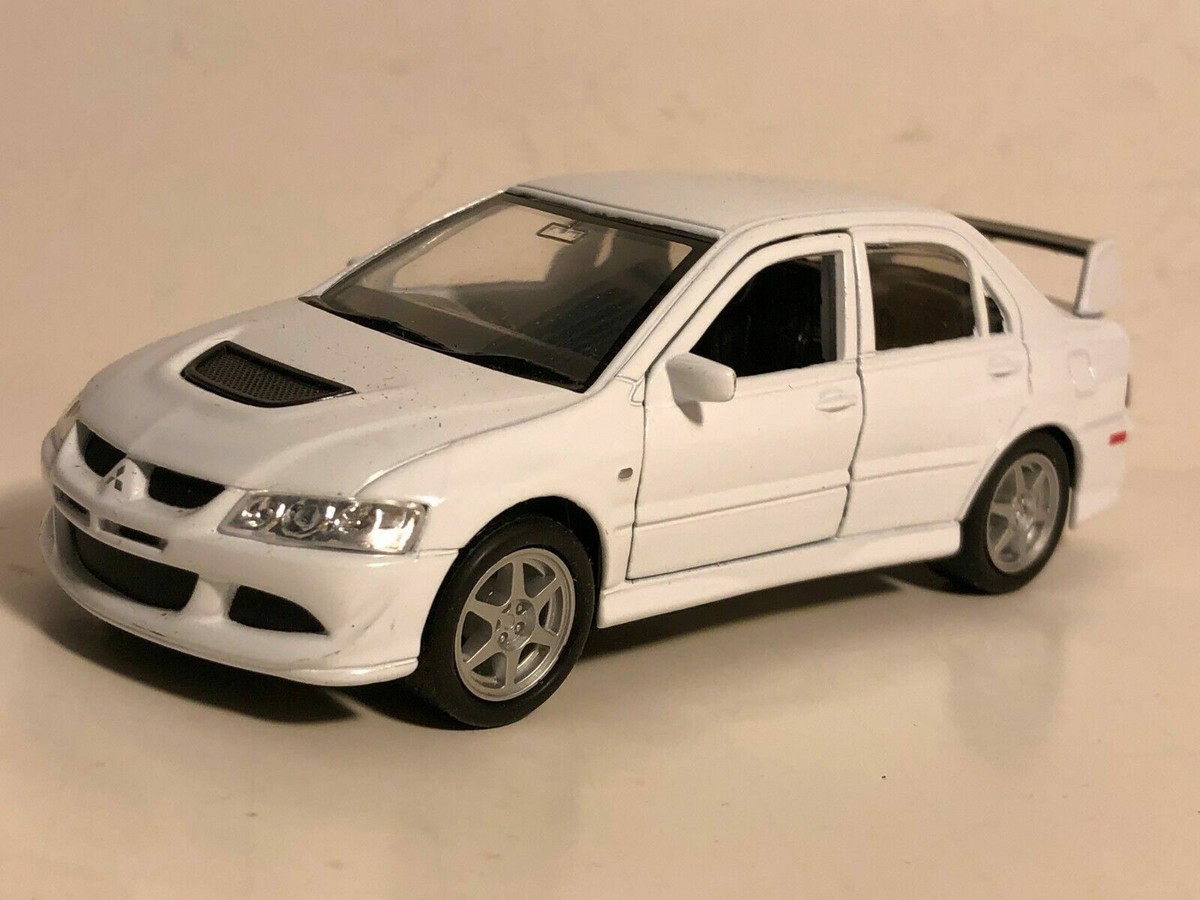 WELLY MITSUBISHI LANCER EVOLUTION XIII EVO 8 WHITE 1:32 PULL BACK