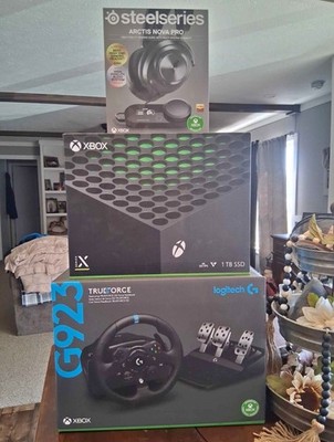 XBox series X Logitech G923 wheel  and a steelseries arctis nova pro head set