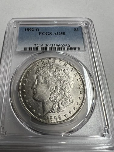 1892 O Morgan Dollar. PCGS AU50