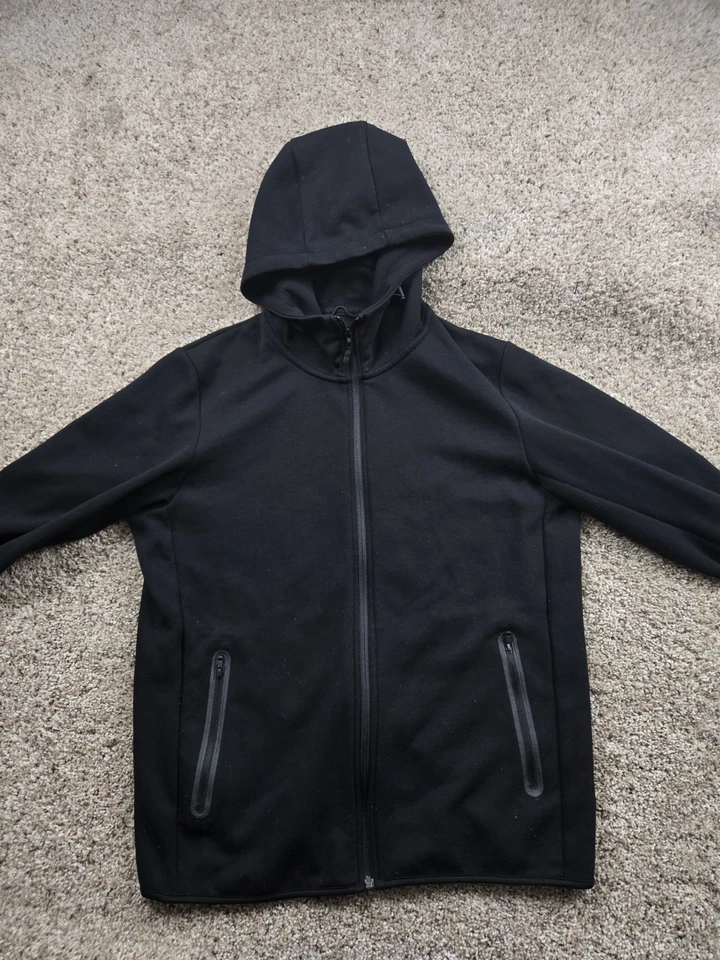 Chaqueta con Capucha Uniqlo Grande Negra Cremallera Completa Tecnología SECA Bolsillos Polares Manga Larga Foto 3 de 4