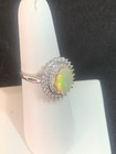 Beautiful S/S Rodium Plated Ethiopian Fire Opal Ring  With Double Halo — photo 2
