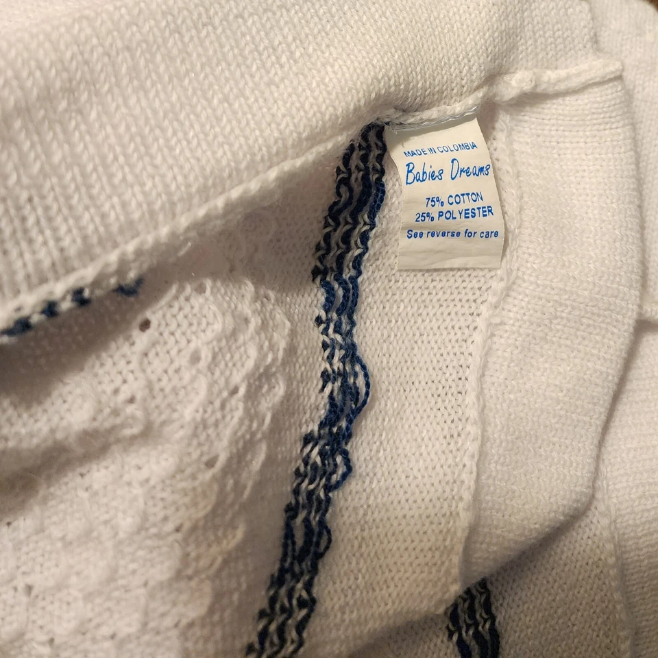 Manta Bebé Velero Lovey 20x36 Bebés Sueños Colombia Blanco Azul Tejido Algodón Foto 3 de 3