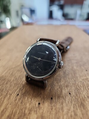 Vintage MOVADO BLACK DIAL STAINLESS STEEL WATCH FROM