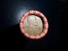 ROLL OF UNSEARCHED WHEAT PENNIES WITH A 1925 AND WHEAT REVERSE ON THE ENDS.
