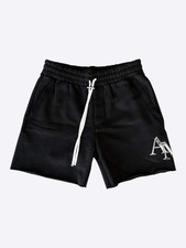 Amiri Black & Chrome Logo Staggered Shorts