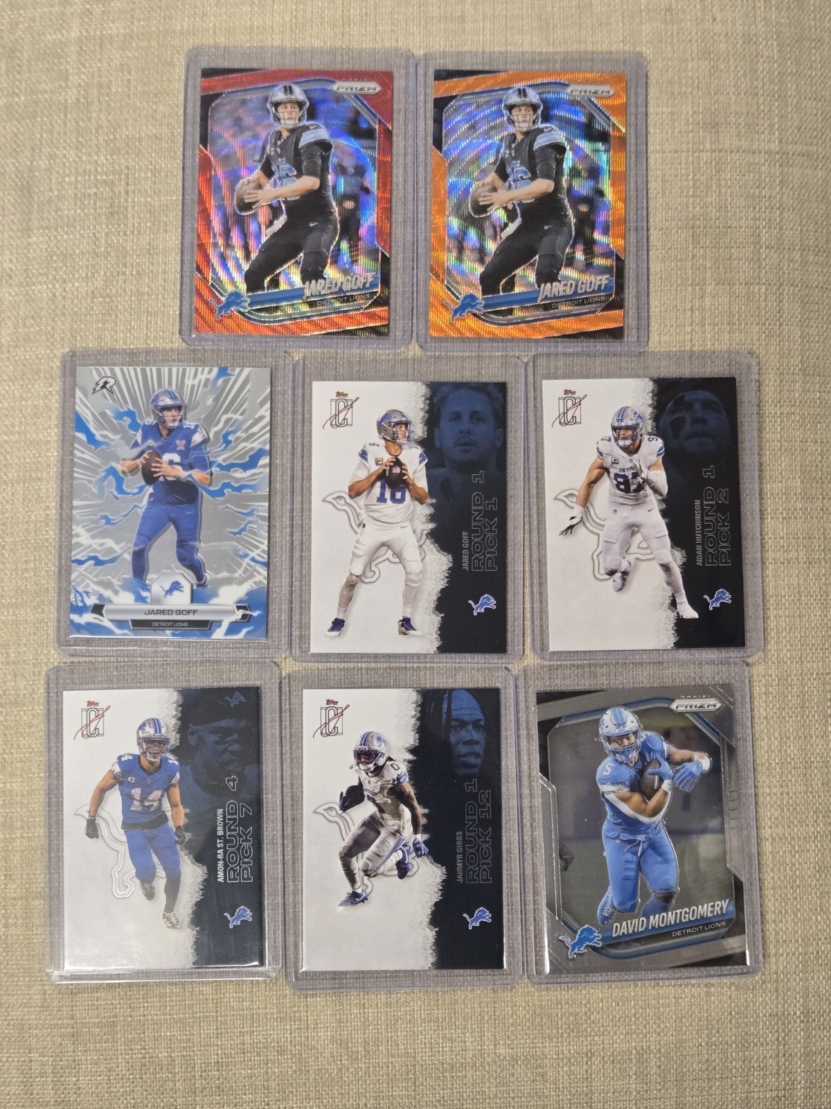 2025 Panini Prizm - Jared Goff #10 Orange Wave Prizm /65