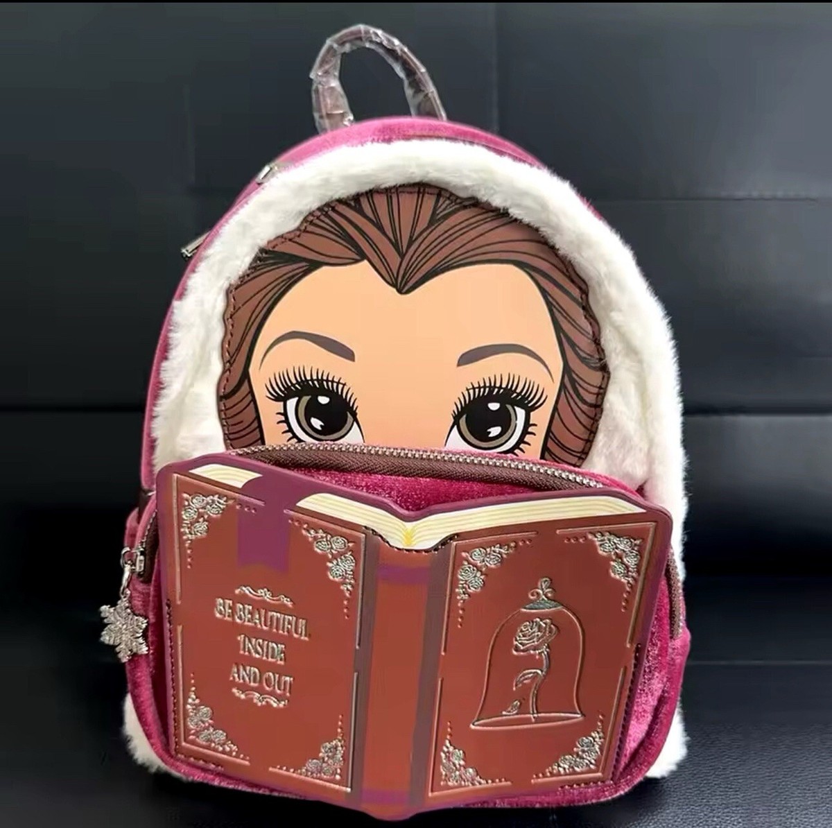 Loungefly Disney Beauty and the Beast Belle Winter Wear Storybook Mini Backpack Our enchanting new Beauty and the Beast mini backpack (LE  main image 4