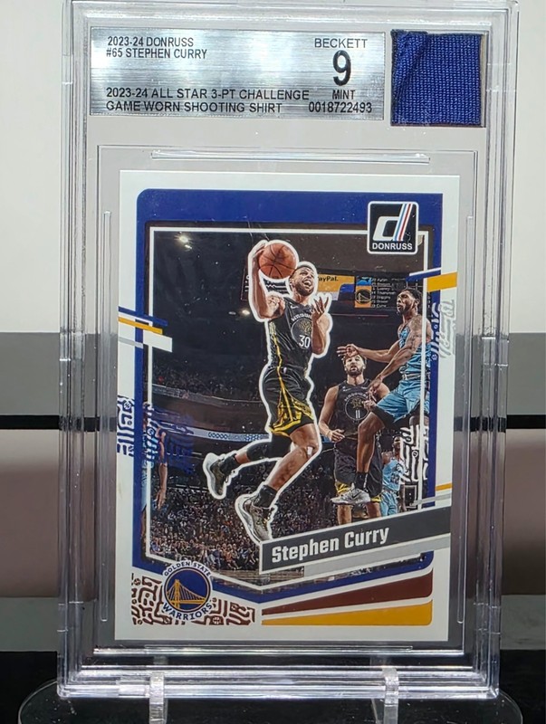 2023-24 Donruss #65 Stephen Curry worn shooting shirt Golden State