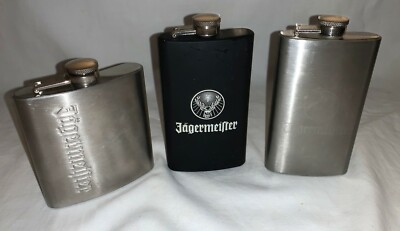 (Group of 3) JAGERMEISTER Stainless Steel and Black Covering FLASKS