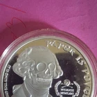 Silver Round 'Paper Is Power' Skull Design Collectible Coin in Capsule