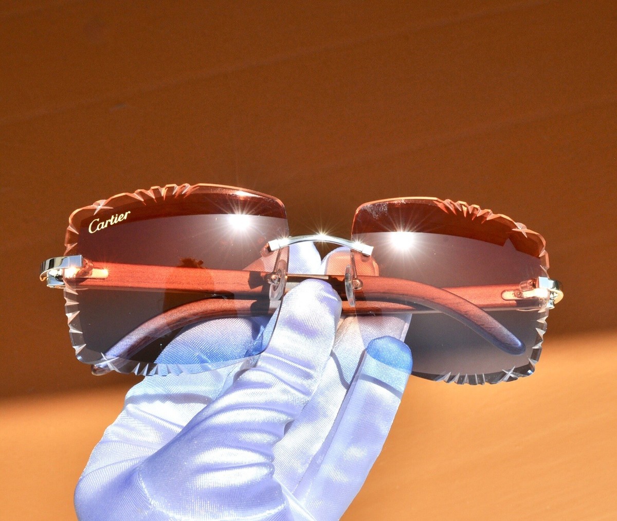 orange cartier glasses