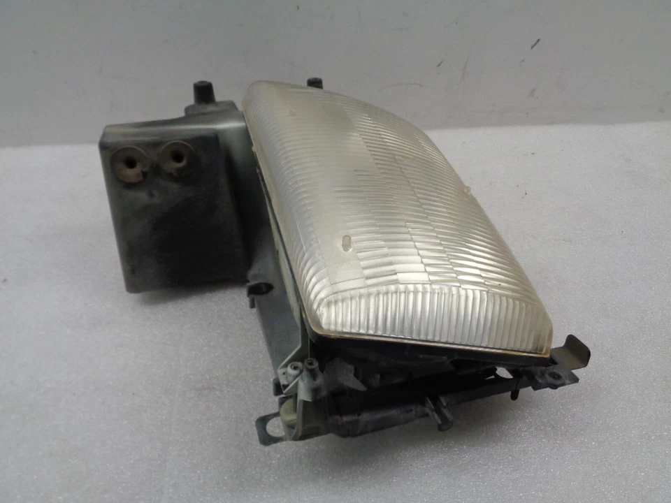 Lámpara de faro izquierdo para conductor Dodge Ram 1500 Van 98-03 con soporte OEM AK2411242 Foto 4 de 4