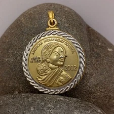 American Indian Relief Council 2012 Gold & Silver Tone Coin Pendant