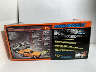 JOHNNY LIGHTNING TOM DANIEL'S BAD NEWS II ORANGE 1:18 DIECAST