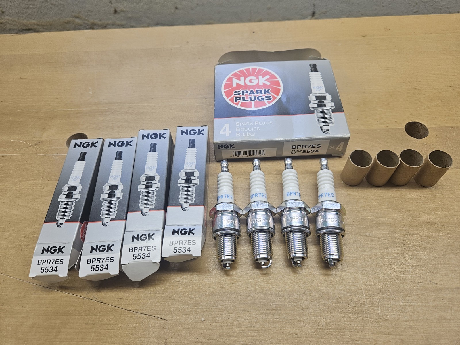 Set of 4 NGK BPR7ES Spark Plugs. Stock #5534. New Old Stock. Complete In Box.