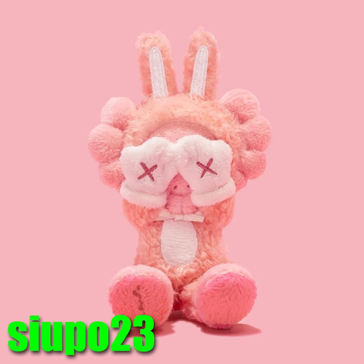 KAWS Holiday Indonesia Plush Charm pink-