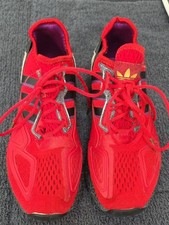 adidas Red Sneakers with Black & Purple Accents