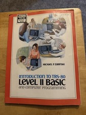 Vintage trs-80 level 2 basic computer and Programming Book
