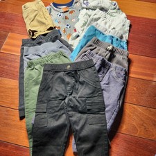 Lot Of Baby Clothes For A Boy. Mostly Pants, A Sweat Suit And Pj's. Size 18 Mo
