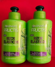 2 PACK GARNIER  LEAVE IN CONDITIONER /RIZOS ELASTICOS /SAVIA DE BAMBÙ Y FRUCTOSA