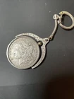 1883 Morgan 90% Silver Dollar Grades AU In A Spinner  Keychain