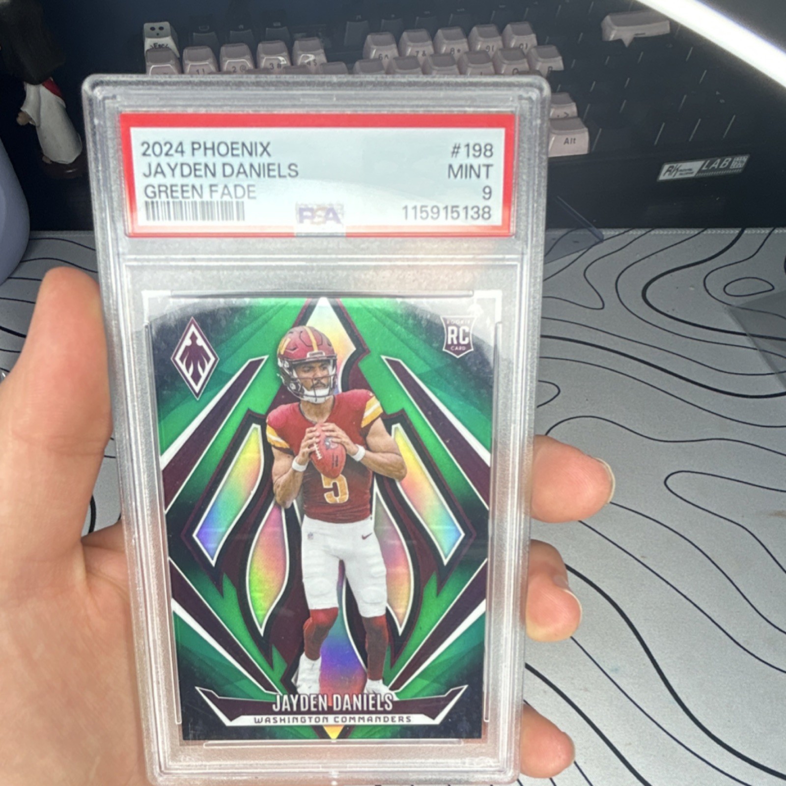2024 Panini Phoenix Green Fade Jayden Daniels Rookie #198 /199 Commanders