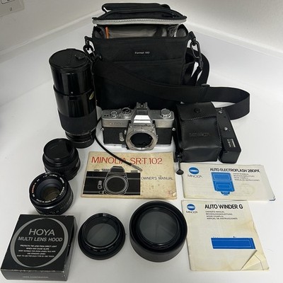 Minolta SRT-102 35mm SLR Film Camera Body, W/ Multiple Lenses, Accessories, Case