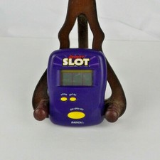 Radica Pocket Slot Electronic Handheld Game Slot Machine Game Casino 1997 TESTED