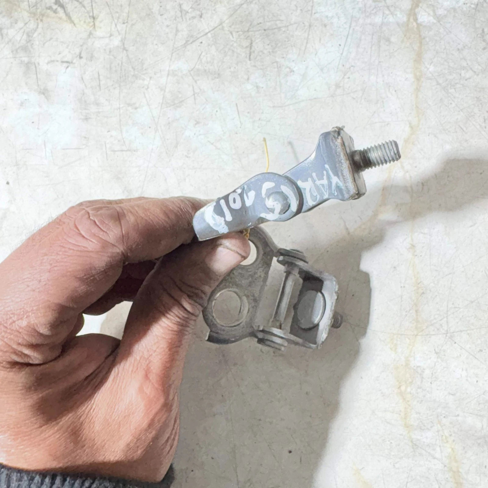 Toyota Yaris XP90 upper back door hinge close view