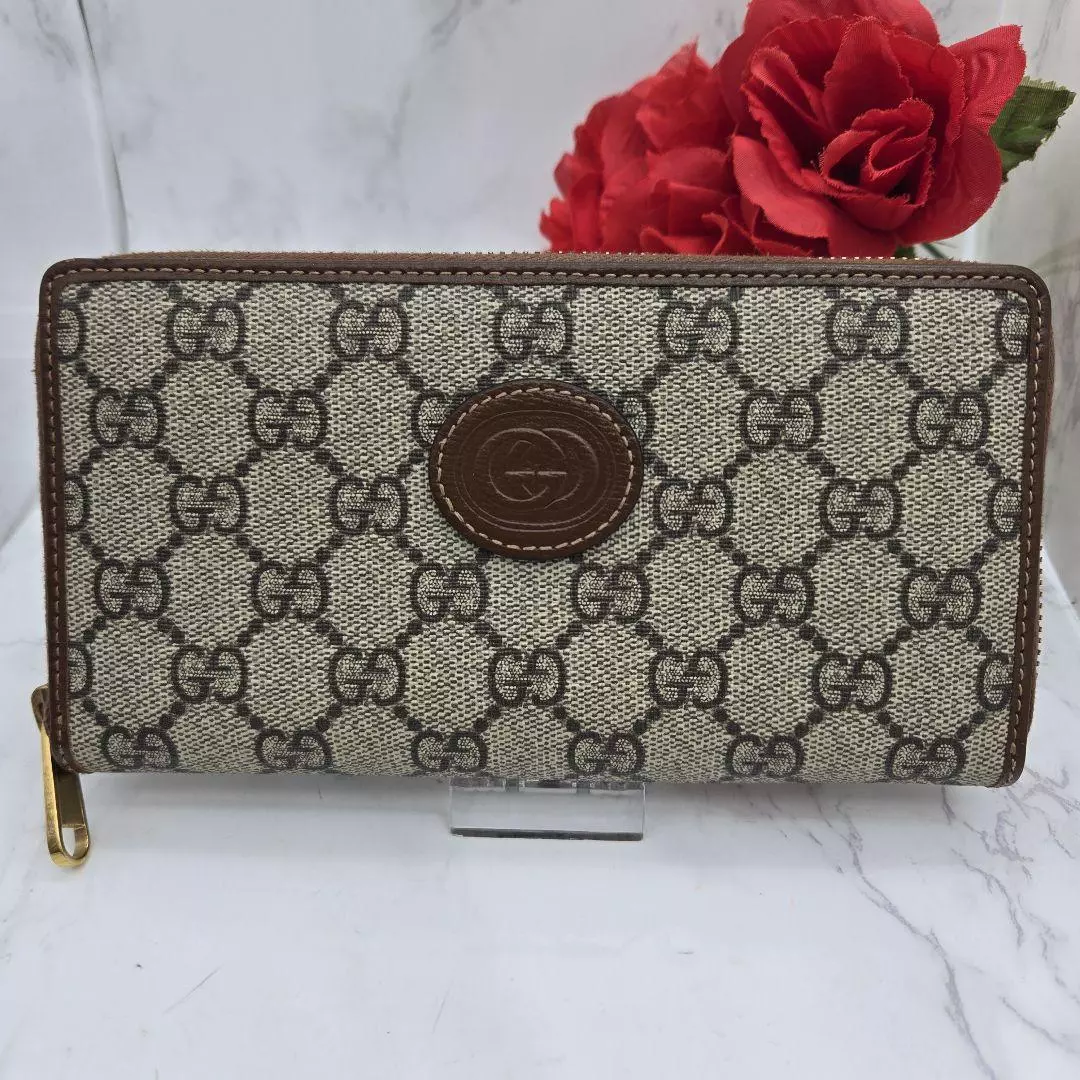 Authentique portefeuille Gucci couleur beige marron H10 cm L19 cm fermeture éclair ronde long logo GG