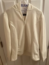 White polyester long sleeve jacket. Very soft