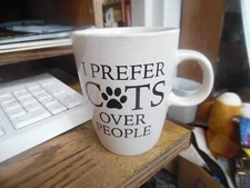 IQ accessories tan mug -" I prefer cats over people" 