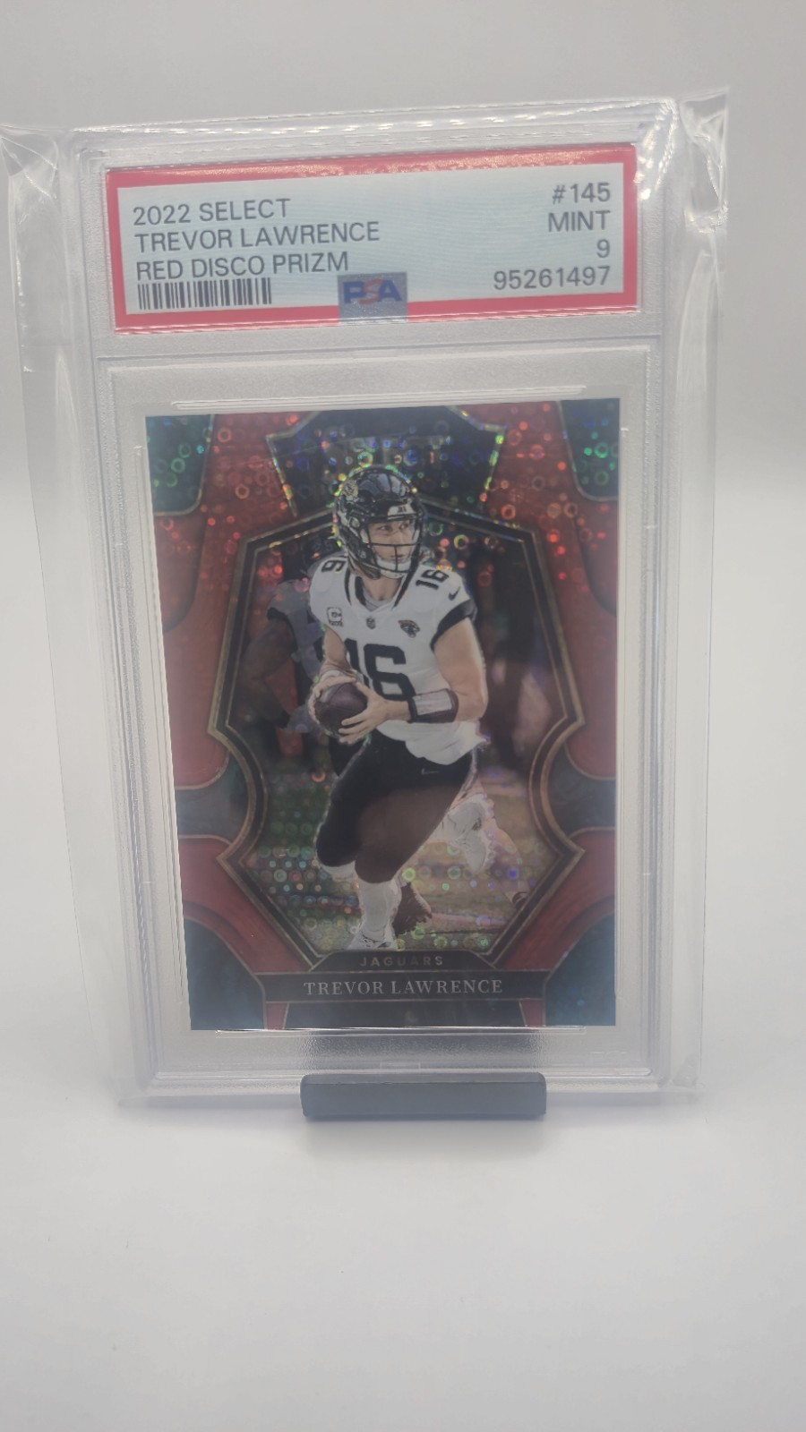 2022 Select Red Disco Prizm Premier #145 Trevor Lawrence /49 PSA 9