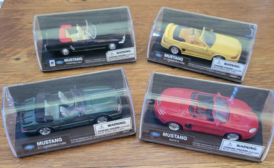 1998 New-Ray Toys FORD MUSTANG  lot of  (4) different  NEW in plastic cases