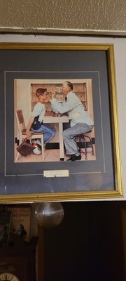 VINTAGE NORMAN ROCKWELL ''AT THE OPTOMETRIST'' 23x19 FRAMED LITHOGRAPH