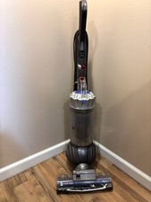 Dyson DC65 Animal Upright Vacuum Cleaner silver Pre-Owned. See description