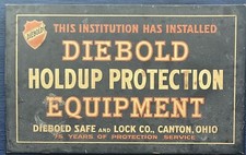 1950's Sign DIEBOLD SAFE & LOCK CO TIN ON CARDBOARD 75 YEARS PROTECTION SERVICE