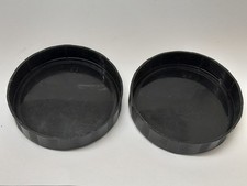 A pair of clean 69mm front dust lens cap covers for binoculars