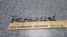 1970 - 1981 Pontiac Firebird Fender Script Emblem Badge  GM Part # 9795240 OEM  