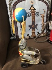 Vintage Tin Litho Circus Elephant Friction Toy Holding Globe With Tassles 
