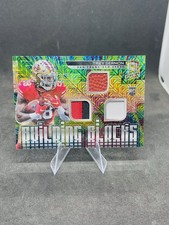 Bloques de construcción Panini Spectra 2021 materiales mojo verde #25 Trey Sermon/25