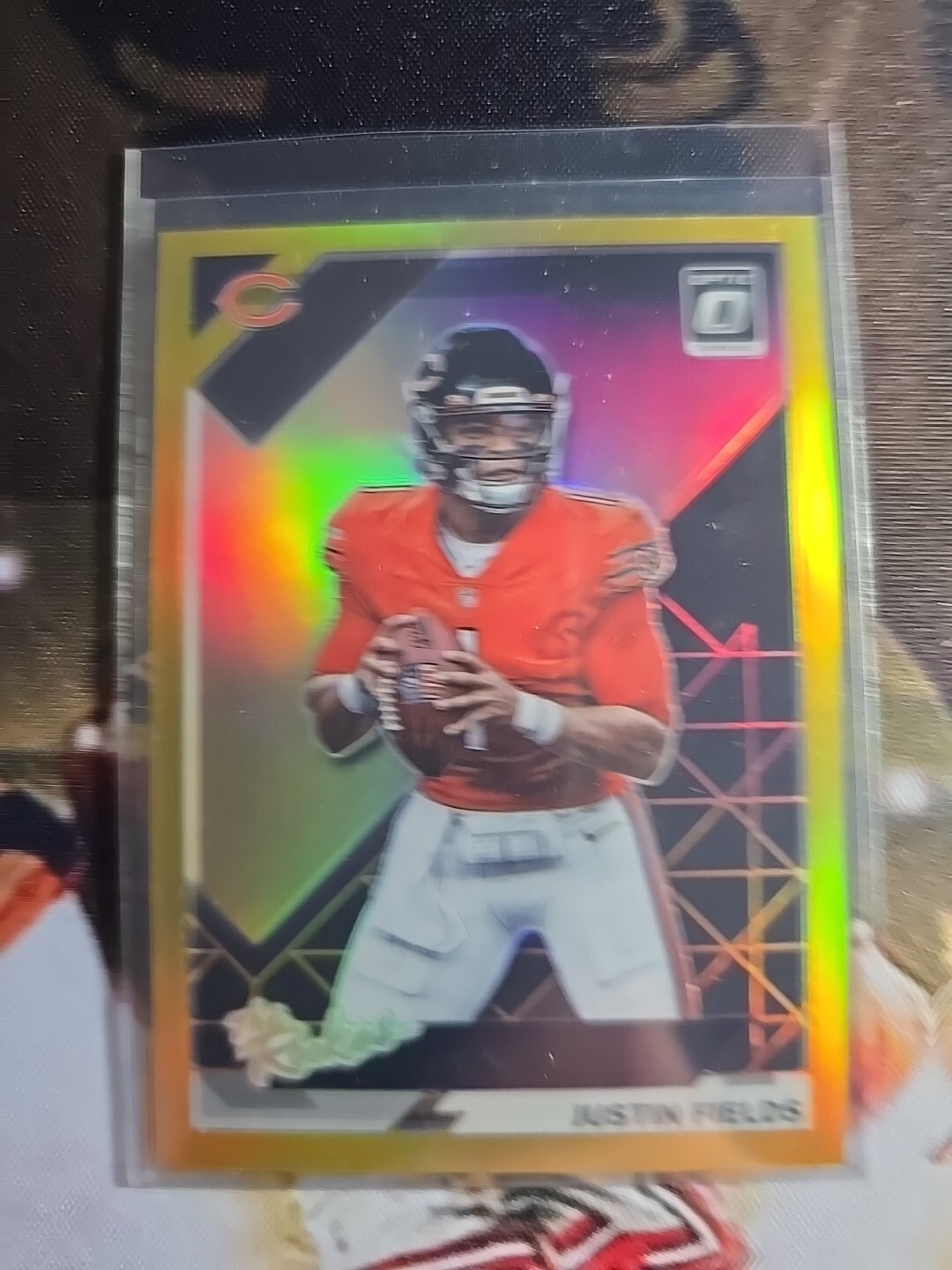 Justin Fields 2021 Donruss Optic The Rookies GOLD PRIZM #'d 06/10
