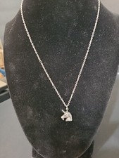 16" Silvertone Chain Necklace With A Pewter Unicorn Pendant.