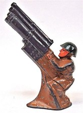 1950s Barclay SOLDIER w/dark gray 3 BARRELLED GUN dime store lead soldier figure